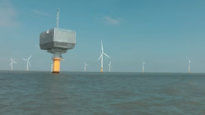 Gunfleet Sands offshore substation platform with wind turbines in the Thames Estuary.