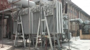 Cooling fans and radiator banks on a power transformer.