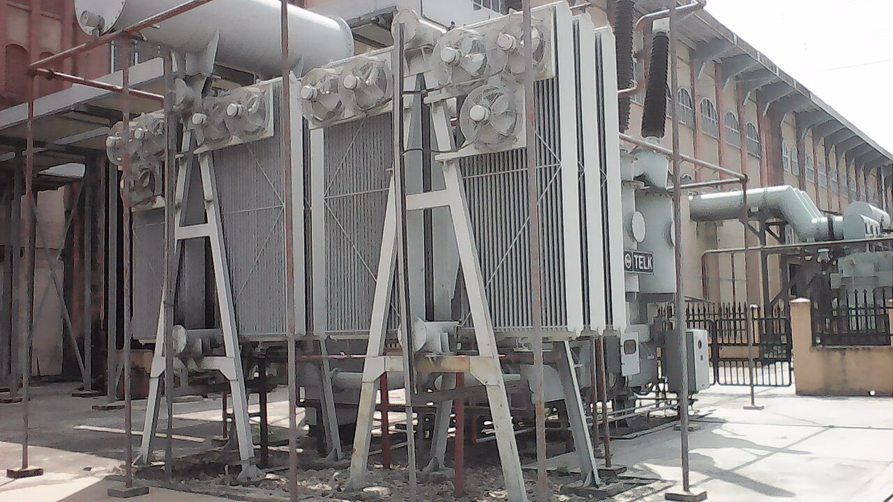 Cooling fans and radiator banks on a power transformer.