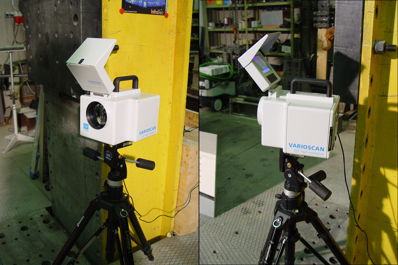 Two views of a tripod-mounted thermal imaging camera.